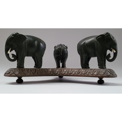 181 - A 19TH CENTURY CARVED ELEPHANT PLATE / BOWL STAND, COMPRISING OF THREE HANDCARVED EBONISED WOODEN EL... 