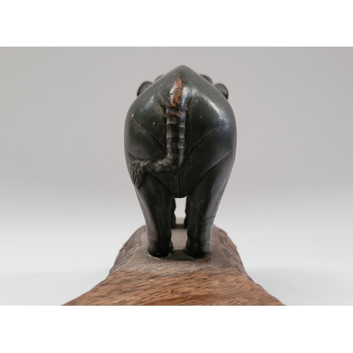 181 - A 19TH CENTURY CARVED ELEPHANT PLATE / BOWL STAND, COMPRISING OF THREE HANDCARVED EBONISED WOODEN EL... 