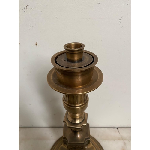 184 - A LARGE ANTIQUE GILT CANDLE HOLDER, ornately decorated support with column design as well as embosse... 