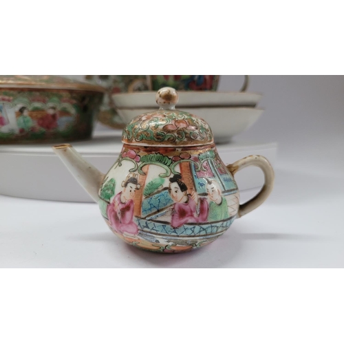 190 - A COLLECTION OF FAMILLE ROSE PORCELAIN ITEMS, includes; two coffee cups with matching saucers, a lid... 