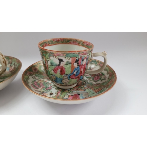 190 - A COLLECTION OF FAMILLE ROSE PORCELAIN ITEMS, includes; two coffee cups with matching saucers, a lid... 