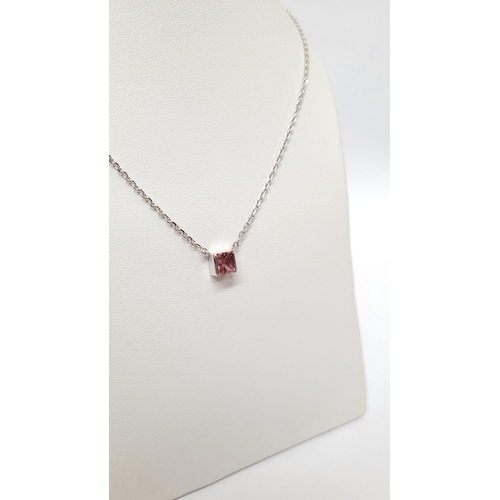 196 - A VERY PRETTY CARTIER TANK PENDANT NECKLACE IN 18CT WHITE GOLD WITH A PINK TOURMALINE STONE, marked ... 