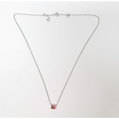 196 - A VERY PRETTY CARTIER TANK PENDANT NECKLACE IN 18CT WHITE GOLD WITH A PINK TOURMALINE STONE, marked ... 