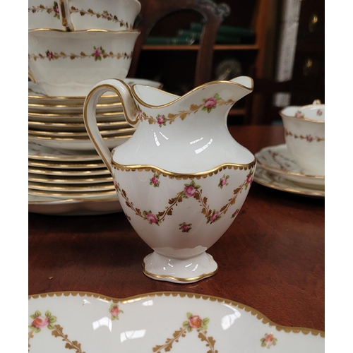 197 - A PARTIAL CRESCENT & SONS BEST BURNISHED GOLD ENGLISH TEA SET, with floral bowl decoration; includes... 