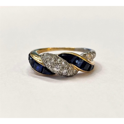 20 - A FANTASTIC TIFFANY & CO. TWO TONE SAPPHIRE AND DIAMOND TWIST RING, 1ct round brilliant cut diamonds... 