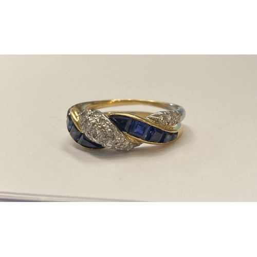 20 - A FANTASTIC TIFFANY & CO. TWO TONE SAPPHIRE AND DIAMOND TWIST RING, 1ct round brilliant cut diamonds... 