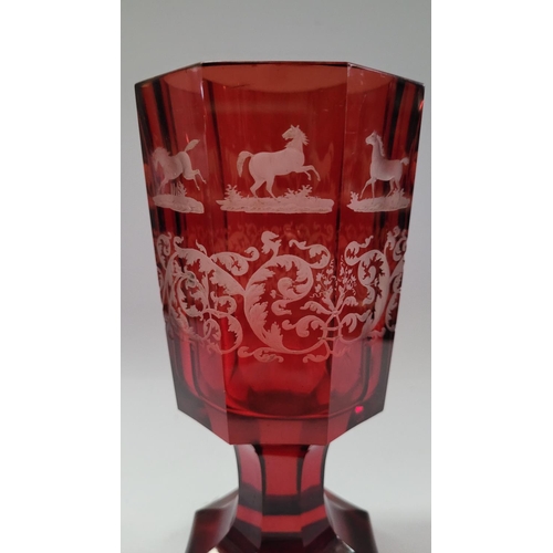 200 - A LARGE OCTAGONAL SHAPED INTAGLIO ETCH RED BOHEMIAN GLASS / VASE, decorated with acid etched horse d... 