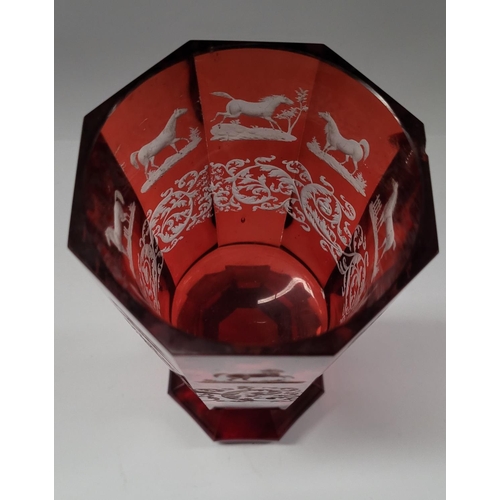 200 - A LARGE OCTAGONAL SHAPED INTAGLIO ETCH RED BOHEMIAN GLASS / VASE, decorated with acid etched horse d... 