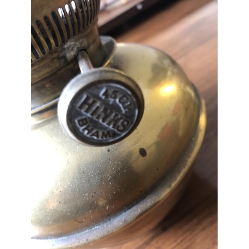 203 - A SMALL ‘HINKS’ BRASS TABLE LAMP, with maker’s name to the adjustment handle, 9 inches tall. Note: *... 