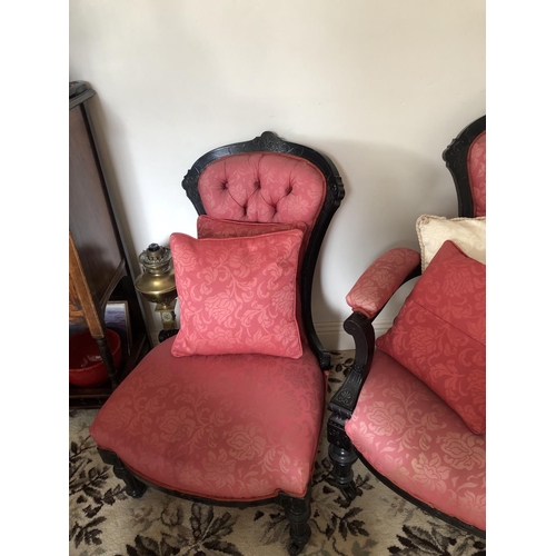 212 - TWO GOOD QUALITY VICTORIAN BUTTON BACKED ‘HIS & HERS’ ARM CHAIRS, each with shield shaped back havin... 