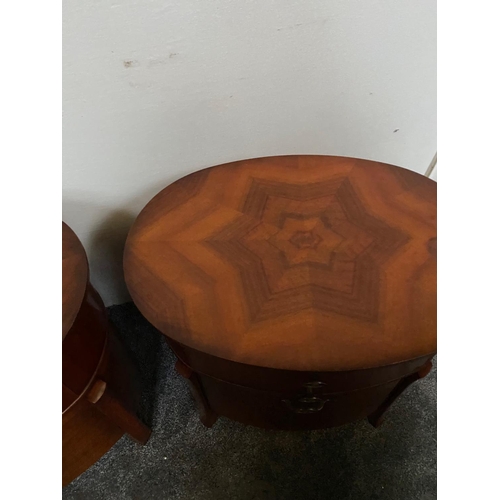 225 - A PAIR OF OVAL SHAPED WALNUT LOCKERS / CABINETS, each with two drawers, the tops with striking book-... 