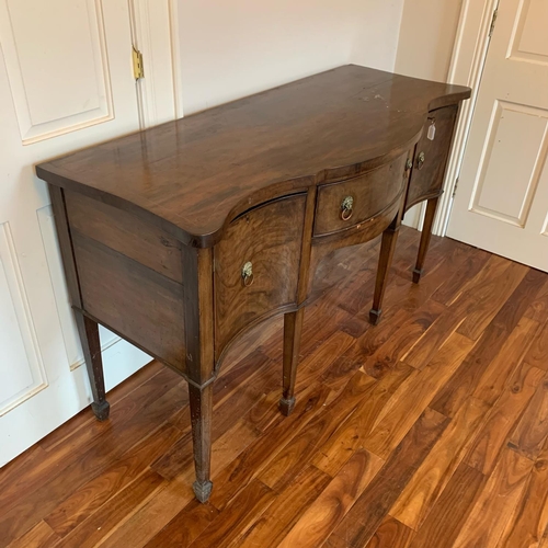 244 - A GOOD QUALITY 19TH CENTURY IRISH FLAME MAHOGANY SIX LEG SERPENTINE SHAPED SIDEBOARD, the serpentine... 