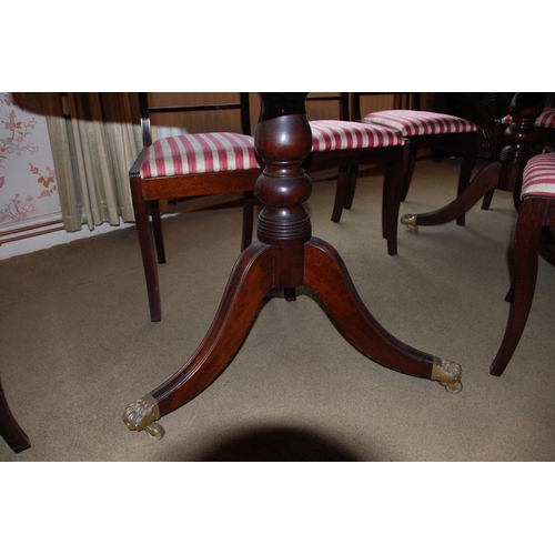 247 - A FINE MAHOGANY TWO POD DINING TABLE WITH CURVED ENDS & REEDED EDGES, raised on a pair of tripod bas... 