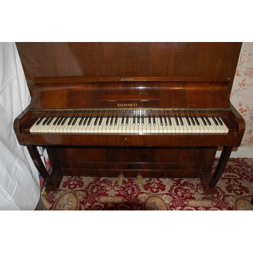 250 - A STEINMETZ UPRIGHT PIANO, with tiger mahogany veneers & brass pedals. Width 52 inches x Depth 23 in... 