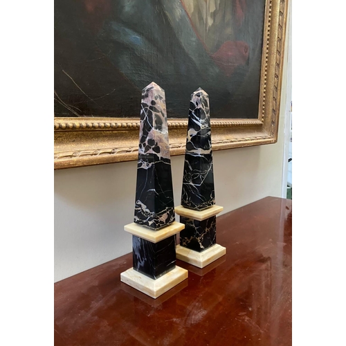 29 - AN EXCELLENT PAIR OF MID 20TH CENTURY MARBLE OBELISKS, body with tapered form, in black Portoro ripp... 