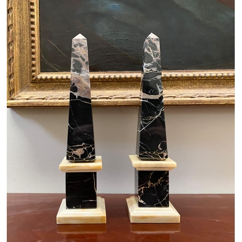 29 - AN EXCELLENT PAIR OF MID 20TH CENTURY MARBLE OBELISKS, body with tapered form, in black Portoro ripp... 