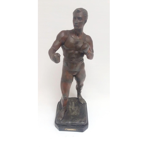 35 - AN EARLY 20TH CENTURY FIGURE OF A BOXER, artist signature impressed to the base; Georg Vacossin. Dim... 