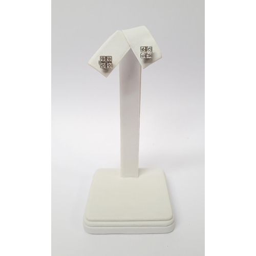 36 - A GEORGEOUS CASED PAIR OF CARTIER DIAMOND CLUSTER STUD EARRINGS, each with four brilliant cut diamon... 