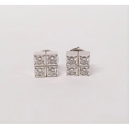 36 - A GEORGEOUS CASED PAIR OF CARTIER DIAMOND CLUSTER STUD EARRINGS, each with four brilliant cut diamon... 