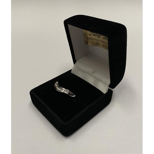 37 - A PAIR OF ELEGANT 18CT WHITE GOLD DIAMOND WEDDING BANDS, both set with eleven round cut diamonds, bo... 