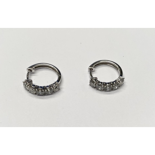 38 - A PAIR OF FINEROCK 14CT WHITE GOLD DIAMOND HOOP EARRINGS, each with five round cut diamonds in 14ct ... 