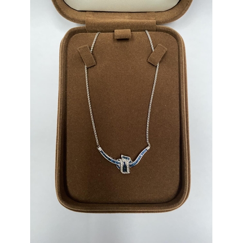 4 - AN EXQUISITE 14CT WHITE GOLD DIAMOND AND SAPPHIRE ACCENT NECKLACE, featuring five channel set sapphi... 