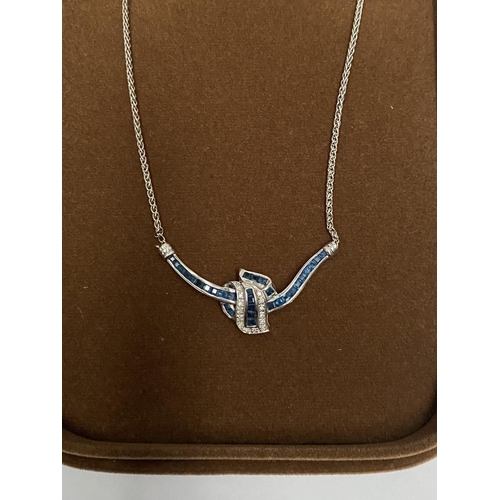 4 - AN EXQUISITE 14CT WHITE GOLD DIAMOND AND SAPPHIRE ACCENT NECKLACE, featuring five channel set sapphi... 