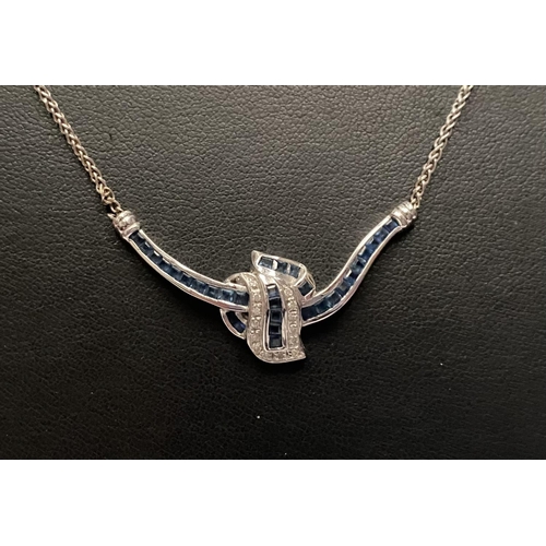 4 - AN EXQUISITE 14CT WHITE GOLD DIAMOND AND SAPPHIRE ACCENT NECKLACE, featuring five channel set sapphi... 