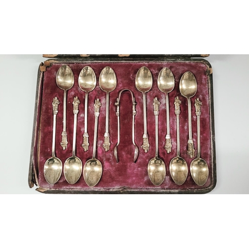 40 - A LATE 19TH CENTURY CASED SET OF 12 SILVER MONK TEA SPOONS WITH SUGAR TONGS, each spoon with a monk ... 