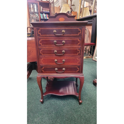 44 - AN EDWARDIAN MAHOGANY & SATINWOOD INLAID MUSIC CABINET, with 5 drop front drawers each with a swing ... 