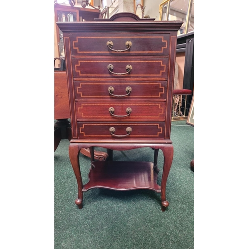 44 - AN EDWARDIAN MAHOGANY & SATINWOOD INLAID MUSIC CABINET, with 5 drop front drawers each with a swing ... 