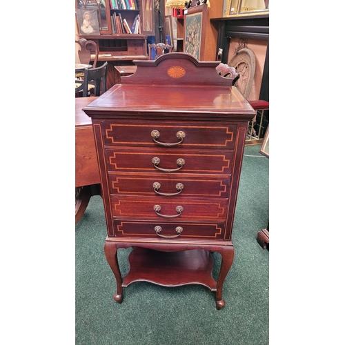 44 - AN EDWARDIAN MAHOGANY & SATINWOOD INLAID MUSIC CABINET, with 5 drop front drawers each with a swing ... 