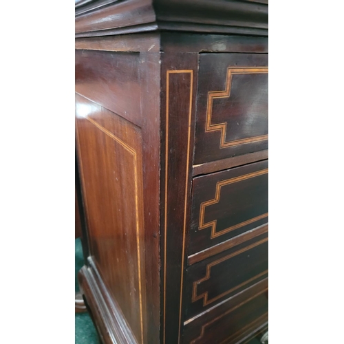 44 - AN EDWARDIAN MAHOGANY & SATINWOOD INLAID MUSIC CABINET, with 5 drop front drawers each with a swing ... 