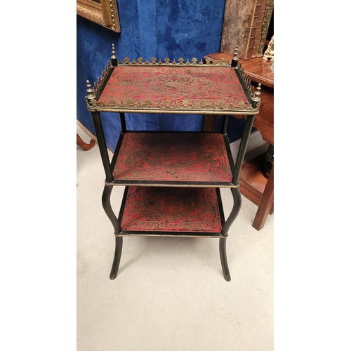 46 - A LATE 19TH CENTURY THREE TIER ‘BOULLE’ BRASS INLAID TABLE / WHAT-NOT, the top tier with a raised br... 