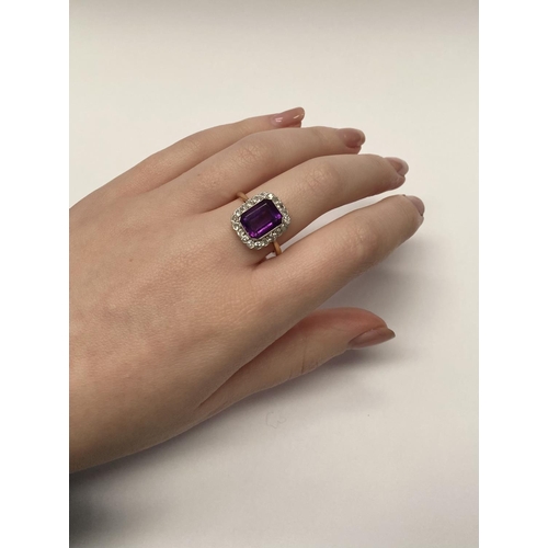 5 - A STUNNING AMETHYST AND DIAMOND CLUSTER RING, beautiful emerald cut amethyst surrounded by 20 round ... 