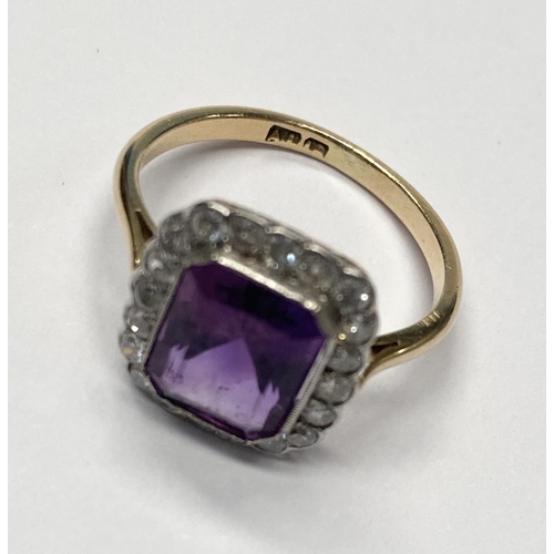 5 - A STUNNING AMETHYST AND DIAMOND CLUSTER RING, beautiful emerald cut amethyst surrounded by 20 round ... 