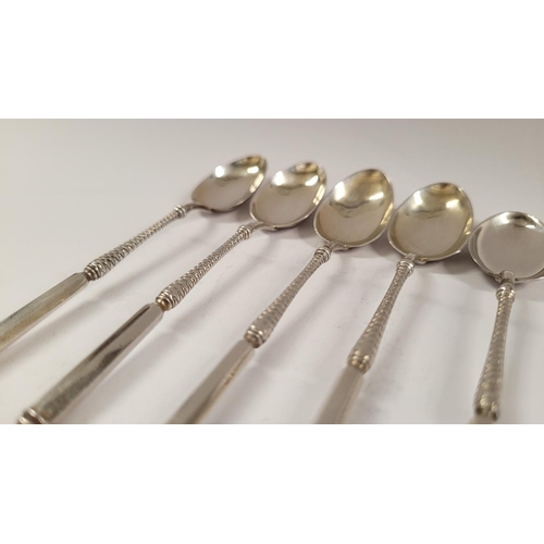 50 - A FINE SET OF FIVE LATE 19TH CENTURY SILVER TEA SPOONS, with decorative stems. London, date letter o... 