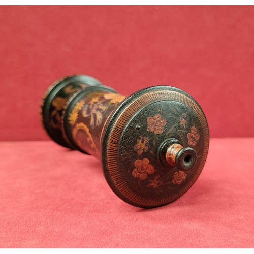 52 - A TURNED LAQUERED WOODEN TRINKET COLUMN BOX, with lift away lid, decorated all over with floral deta... 