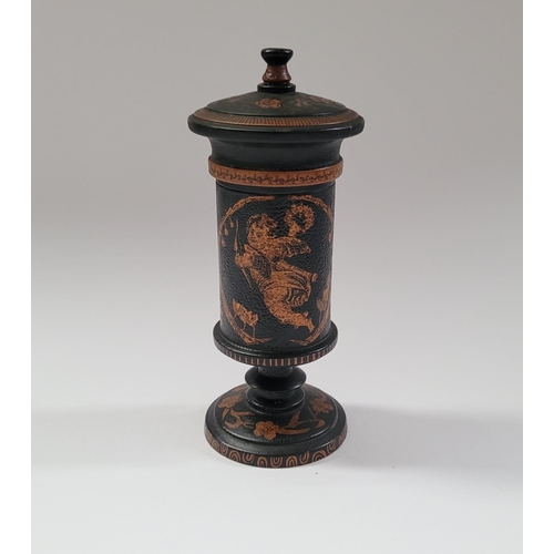 52 - A TURNED LAQUERED WOODEN TRINKET COLUMN BOX, with lift away lid, decorated all over with floral deta... 