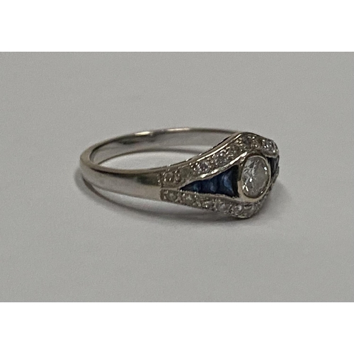 6 - A BEAUTIFUL 18CT WHITE GOLD ART DECO DIAMOND AND SAPPHIRE RING, central .25ct round brilliant cut di... 