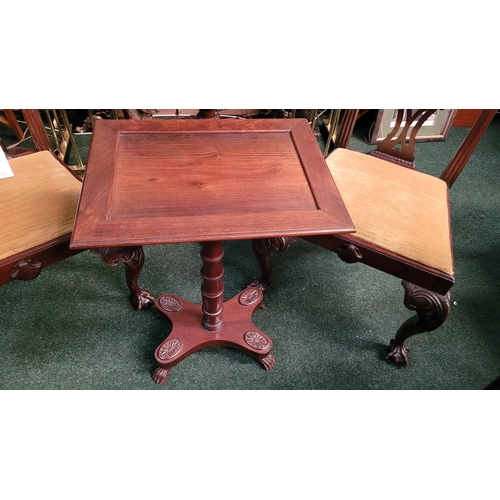 65 - A REGENCY STYLE ROSEWOOD OCCASIONAL TABLE, debossed top with shallow lip on edge, supported by a rin... 