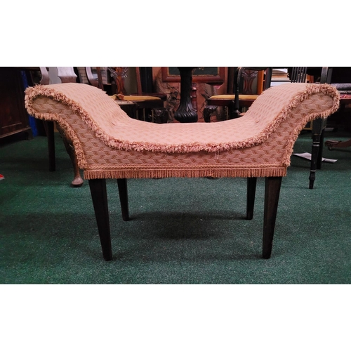 67 - A GOOD QUALITY 19TH CENTURY BUTTON TOPPED WINDOW / BED-END SEAT, with curved elbow rests, upholstere... 