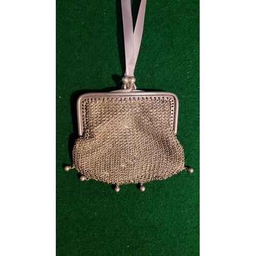 79 - TWO LOVELY VINTAGE FINE-MESH PURSES, (i) A long Fine Mesh purse with curved top frame with ball tipp... 