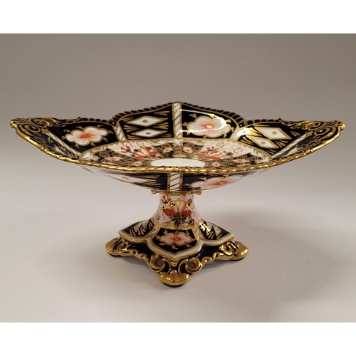 85 - TWO PIECES OF ROYAL CROWN DERBY; (i) A beautiful cake dish with scalloped rim and raised on a column... 