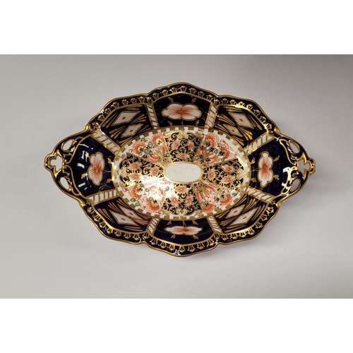 85 - TWO PIECES OF ROYAL CROWN DERBY; (i) A beautiful cake dish with scalloped rim and raised on a column... 