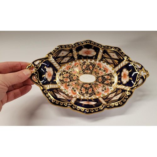 85 - TWO PIECES OF ROYAL CROWN DERBY; (i) A beautiful cake dish with scalloped rim and raised on a column... 