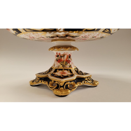 85 - TWO PIECES OF ROYAL CROWN DERBY; (i) A beautiful cake dish with scalloped rim and raised on a column... 