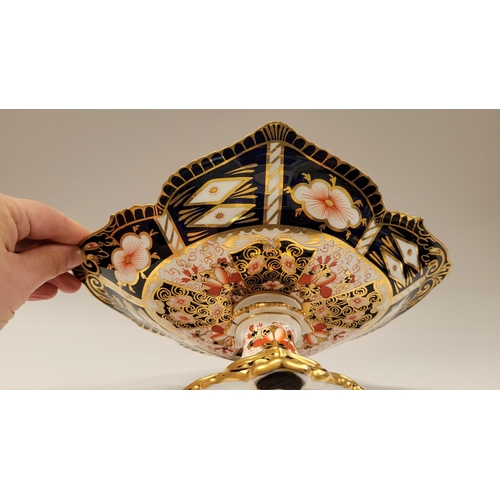 85 - TWO PIECES OF ROYAL CROWN DERBY; (i) A beautiful cake dish with scalloped rim and raised on a column... 