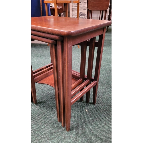 98 - A MAHOGANY & SATINWOOD INLAID NEST OF THREE TABLES, raised tapered legs, the smallest table with a s... 