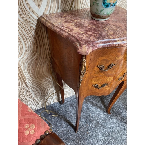 103 - A GOOD MARQUETRY INLAID BOMBE SHAPED TWO DRAWER MARBLE TOPPED CABINET / BEDSIDE / LAMP CABINET, the ... 